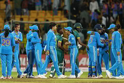 IND-W and RSA-W players greet after match